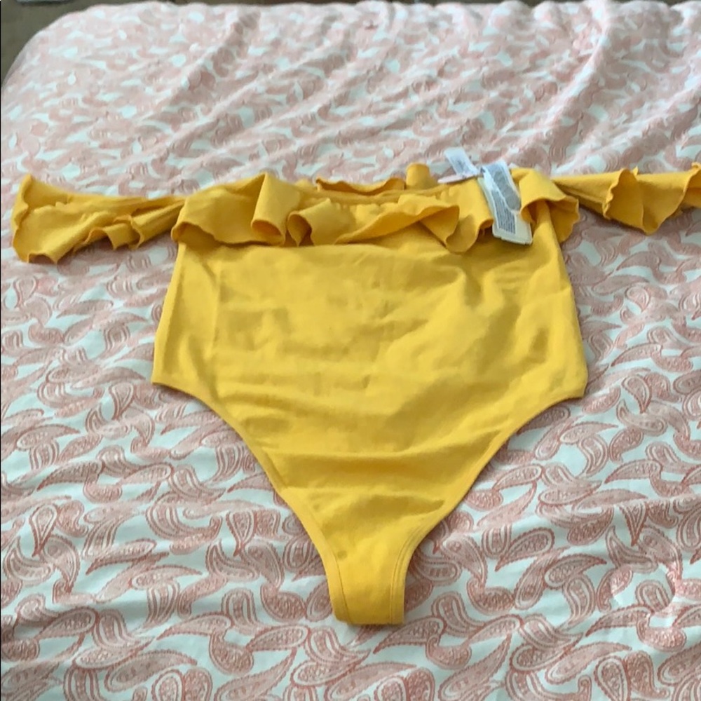 Yellow/gold looking bodysuit